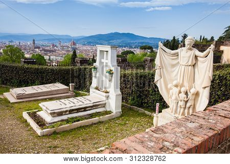 Florence, Italy - April, 2018: Cemetery Of The Holy Door A And The Beautiful City Of Florence
