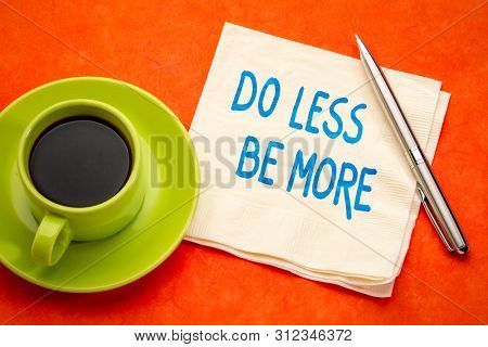 Do less, be more inspirational advice - handwriting on a napkin with a cup of coffee