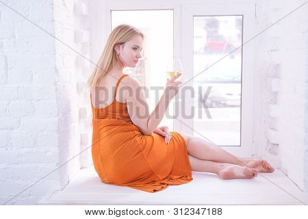 Pretty Plus Size Caucasian Woman Drink Wine In The Morning Alone At Home