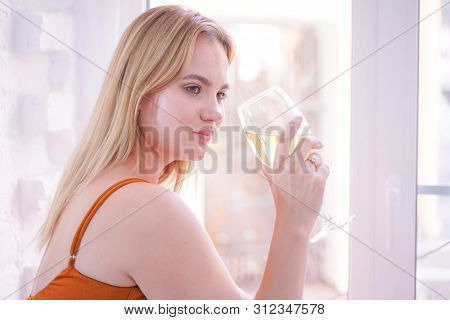 Pretty Plus Size Caucasian Woman Drink Wine In The Morning Alone At Home