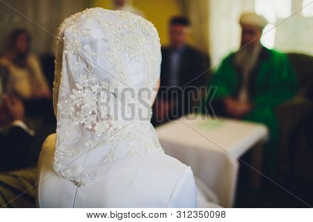 Bride And Groom Asian Muslims Marry In A Beautiful Red Love Theme. Celebration Nikah Day.