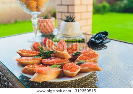 Tartlets With Cheese And Red Caviar. Selective Focus. Copy Space.