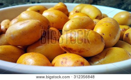 Fresh Crunchy & Sweet Yellow Barhi Dates | Yellow Semi-ripe Dates In Plate