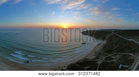 Aerial panorama from Amado beach at the westcoast in Portugal at sunset