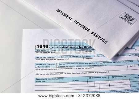 Three Mails From The Internal Revenue Service Lie On 1040, Schedule D Form 1040 And 1040a Tax Forms