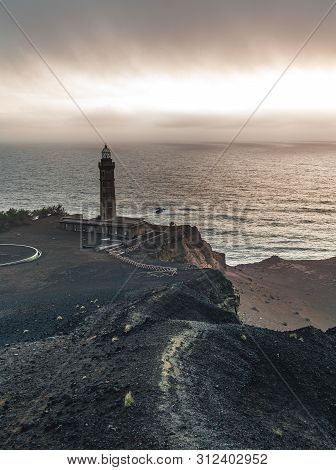 View Over Capelinhos Volcano, Lighthouse Of Ponta Dos Capelinhos On Western Coast On Faial Island, A