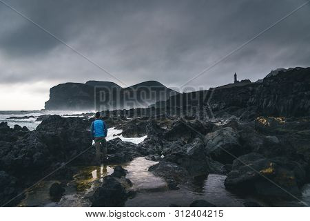 View Over Capelinhos Volcano, Lighthouse Of Ponta Dos Capelinhos On Western Coast On Faial Island, A