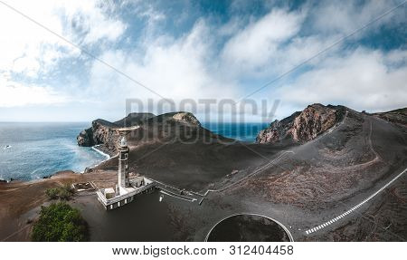 View Over Capelinhos Volcano, Lighthouse Of Ponta Dos Capelinhos On Western Coast On Faial Island, A
