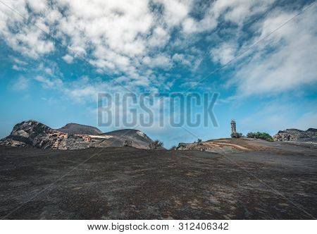 View Over Capelinhos Volcano, Lighthouse Of Ponta Dos Capelinhos On Western Coast On Faial Island, A