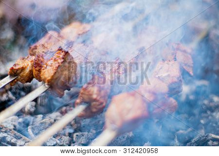 Grilled Shish Kebab On Skewer. Roasted Beef Meat Cooked At Barbecue. Traditional Eastern Dish Shashl
