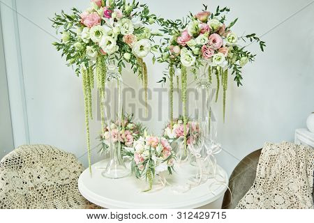 Luxury Floral Arrangement Of Pink And White Flowers In Glass Vases On Wood Table, Copy Space. Weddin