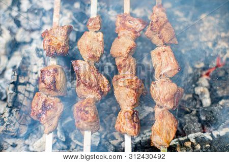 Grilled Shish Kebab On Skewer. Roasted Beef Meat Cooked At Barbecue. Traditional Eastern Dish Shashl