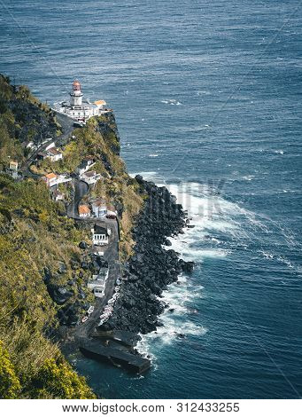 Dramatic View Down To Lighthouse On Ponta Do Arnel, Nordeste, Sao Miguel Island, Azores, Portugal