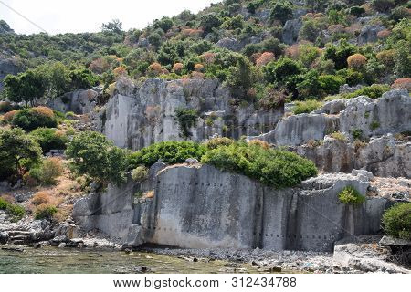 The Ruins Of The City Of Mira, Kekova, An Ancient Megalithic City Destroyed By An Earthquake.