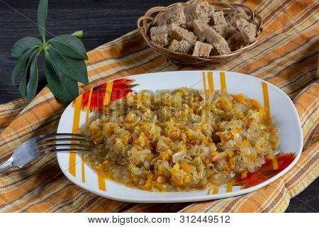Stewed Cabbage With Carrot And Onion On Plate