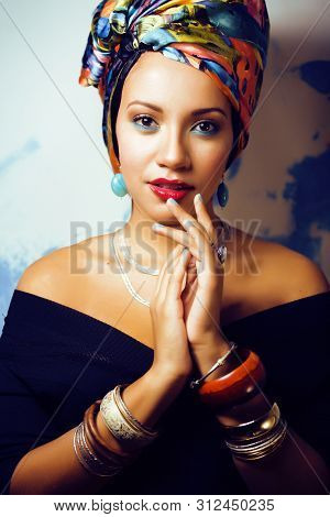Beauty Bright African Woman With Creative Make Up, Shawl On Head Like Cubian Closeup Smiling