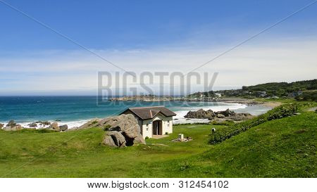 Tanesashi Kaigan Coast. The Coastline Includes Both Sandy And Rocky Beaches, And Grassy Meadows Scen