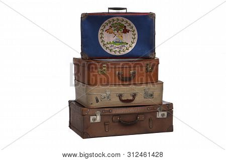 Belize, Belizean Travel Concept. Group Of Vintage Suitcases Isolated On White Background
