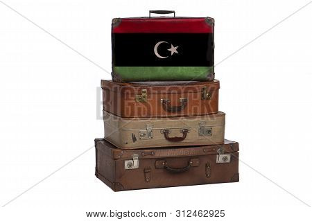 Libya, Libyan Travel Concept. Group Of Vintage Suitcases Isolated On White Background