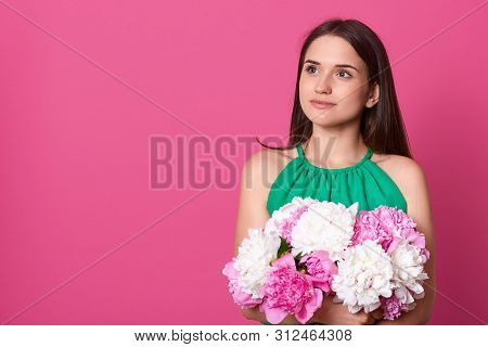 Image Of Thoughtful Dreamy Young Woman Having Black Hair, Looking Aside, Having Pensive Look, Wearin