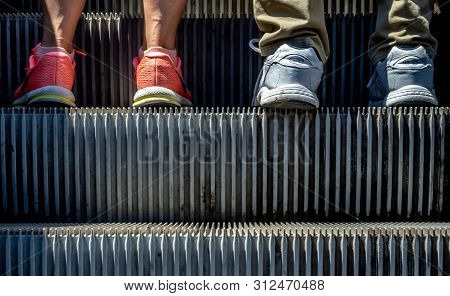 Bucharest, Romania - June 27, 2018: People Go Up The Escalators In The University Passage (pasajul U
