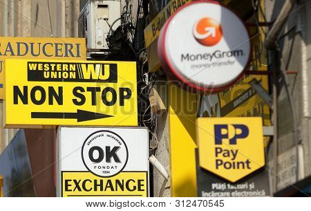 Bucharest, Romania - October 10, 2018: Several Western Union, Moneygram And Pay Point Commercials Ar