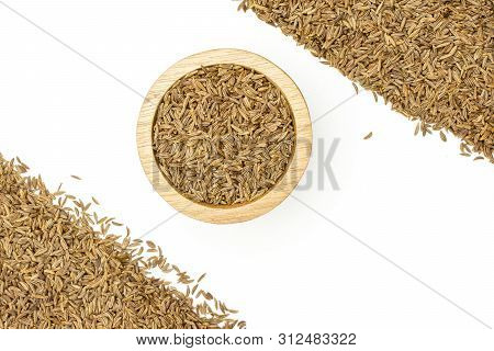 Lot Of Whole Dry Caraway Fruits Small Crescent In A Wooden Bowl Flatlay Isolated On White Background