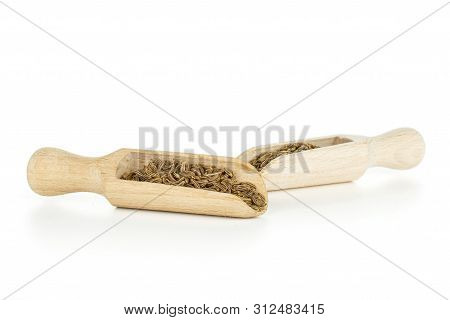 Lot Of Whole Dry Caraway Fruits In Two Scoops Isolated On White Background