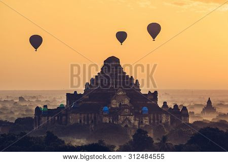 The Beautiful Scenery View Of Hot Air Balloons Flying Over Dhammayangyi Temple The Largest Pagoda In