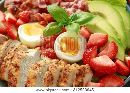 Chicken Cobb Salad With Strawberries, Bacon, Avocado And Boiled Eggs