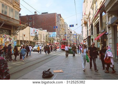 Istanbul, Turkey - May 15, 2019: Pedestrian Tourist Street Istiklal. Istiklal Street Is The Most Pop