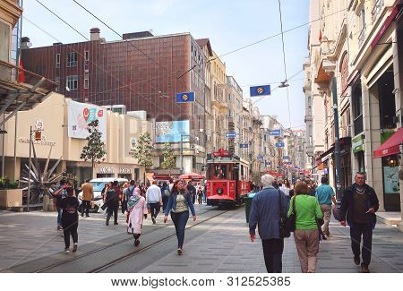 Istanbul, Turkey - May 15, 2019: Pedestrian Tourist Street Istiklal. Istiklal Street Is The Most Pop