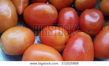 Red Tomatoes In Super Market For Sale