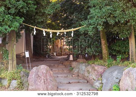 The Gate Of Japanese Shrine In The City For People To Worship Or Pray