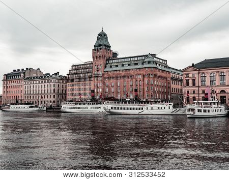 Old But Modern Steamships By The Nybrokajen Quay Waiting For Passengers On A Moody Spring Fay, Stock