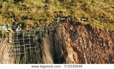 Protection Of Road From Mountain Slough, Rockfall With Metal Accumulative Restraining Net Fences. Wo