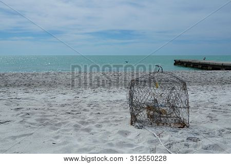 Crab Pot Washed Up Onto The Beach