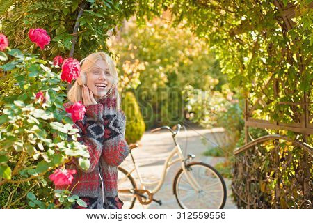Favorite Music. Woman Headphones Blooming Garden. Weekend Activity. Active Leisure And Lifestyle. Gi
