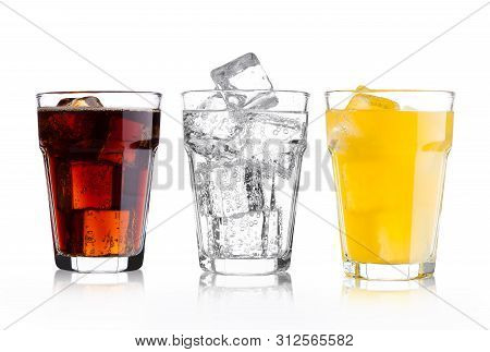Glasses Of Cola And Orange Soda Drink And Lemonade Sparkling Water On White Background With Ice Cube