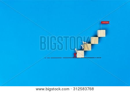 Business Leadership And Teamwork Concept. Leadership Help His Followers To Work Tirelessly. Red Cart