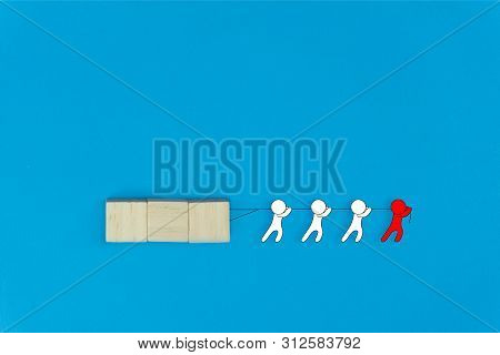 Business Leadership And Teamwork Concept. Leadership Help His Followers To Work Tirelessly. Red Cart