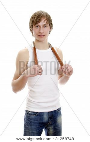 Martial Art. Mand med Nunchucks. Isoleret Over hvide.