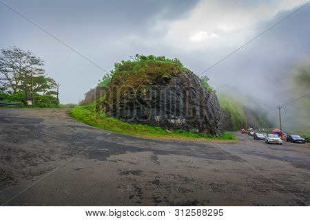 Vehicles Moving Towards The Hills Station Area At Vagamon