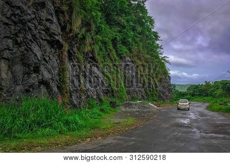 Vehicles Moving Towards The Hills Station Area At Vagamon