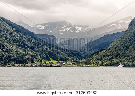 Eidsdal Norwegian Village At The Tafjord With Mountains In The Background, Norddal Municipality, Mør