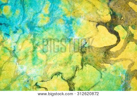 background of textured handmade Thai marbled momi mulberry paper with backlight