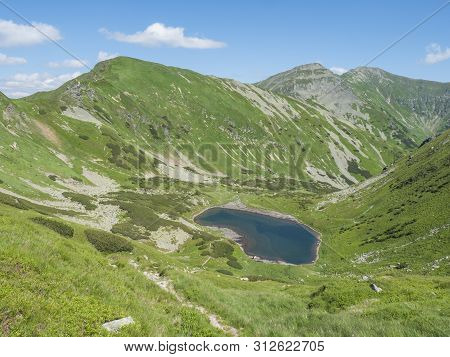 Beautiful Vivid Blue Mountain Lake Horne Jamnicke Pleso With Green Mountain Peaks View From The Jamn