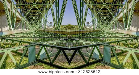 Symmetrical Design Created From Doubling A Photo Of A Green Bridge In California