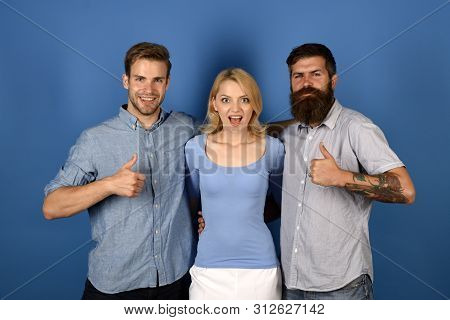 We Are Family. Free Relations. Friendly Relations. Girl And Guys Happy Together. Woman Hugs Two Men.