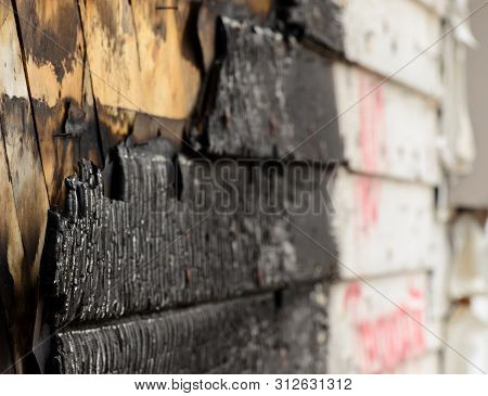 The Exterior Of A House After A House Fire